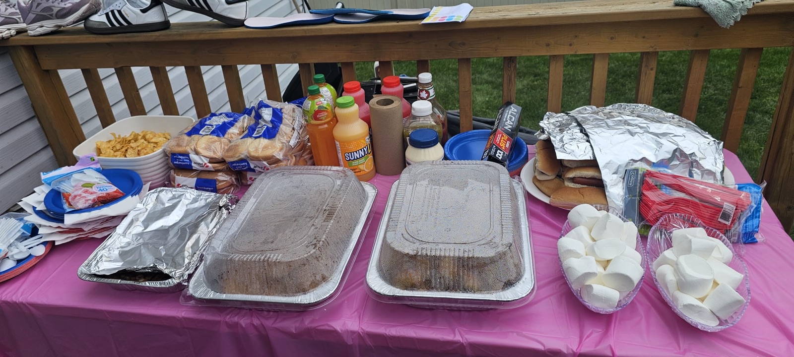 Food laid out on the table for the shared cookout closing the peer support circle day